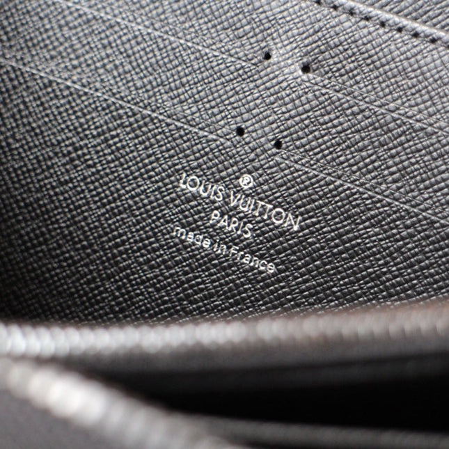 LV 25S ZIPPY WALLET HORIZONTAL 19 IN MONOGRAM ECLIPSE COATED CALFSKIN