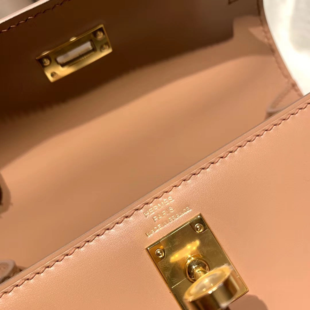 KELLY MINI 20 BAG IN CORAL PINK SMOOTH CALFSKIN WITH GOLD HARDWARE