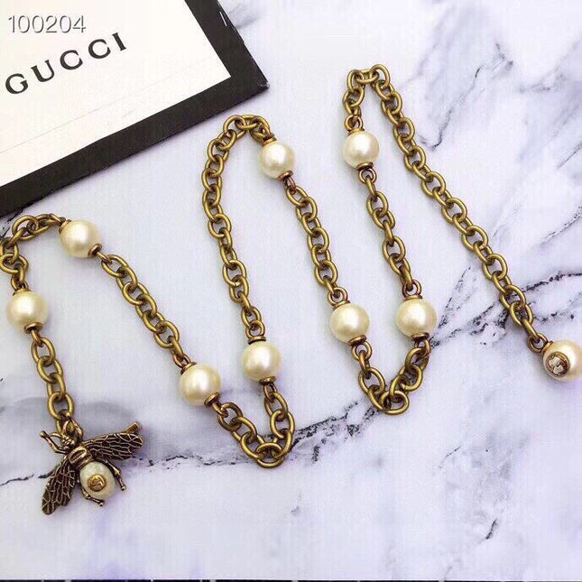 GUCCI 26S BEE CHARM PEARL STATION CHAIN NECKLACE IN AGED GOLD TONE METAL 633889