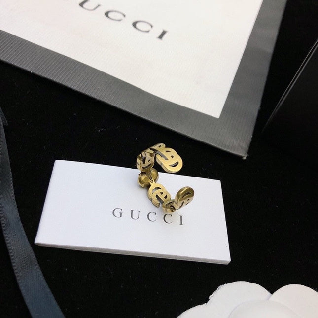 GUCCI 26S DOUBLE G LOGO BLACK CRYSTAL STUD EARRINGS IN ANTIQUE GOLD TONE METAL 627926