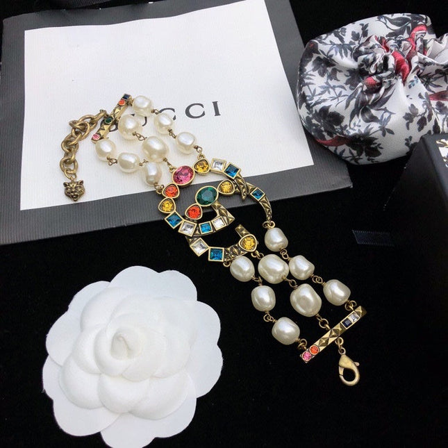 GUCCI 26S GG MULTICOLOR GEM PEARL CHAIN BRACELET IN GOLD TONE METAL 624209