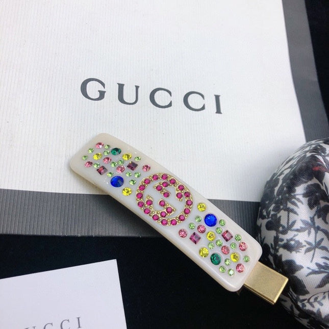 GUCCI 26S DOUBLE G LOGO MULTICOLOR CRYSTAL EMBELLISHED HAIR CLIP IN IVORY RESIN 629879