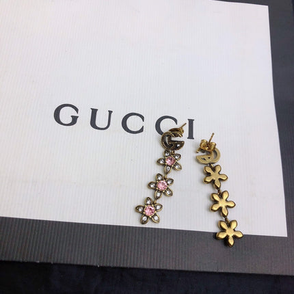 GUCCI 26S DOUBLE G LOGO PINK CRYSTAL FLORAL DROP EARRINGS IN AGED GOLD TONE METAL 629030