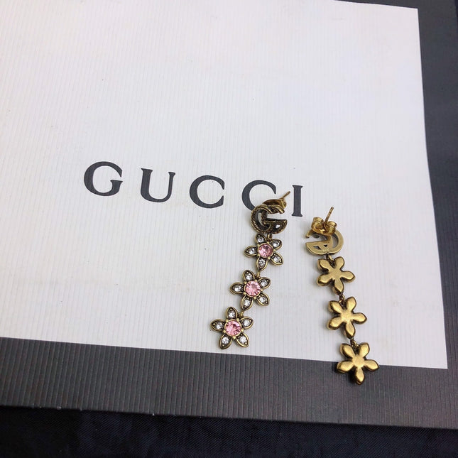 GUCCI 26S DOUBLE G LOGO PINK CRYSTAL FLORAL DROP EARRINGS IN AGED GOLD TONE METAL 629030