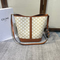 BUCKET 33 IN WHITE TRIOMPHE CANVAS AND BRONZE BROWN CALFSKIN TRIM