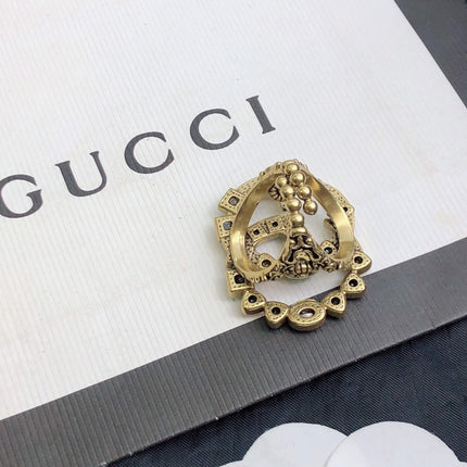 GUCCI 26S GG MULTICOLOR GEM EMBELLISHED BROOCH IN AGED GOLD TONE METAL 624288