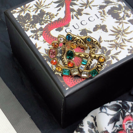 GUCCI 26S GG MULTICOLOR GEM EMBELLISHED BROOCH IN AGED GOLD TONE METAL 624288