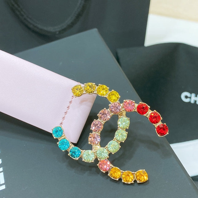 CC BELT 30 MM IN PASTEL PINK CALFSKIN WITH COLORFUL RHINSTONES METAL LOGO