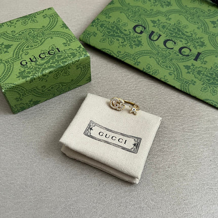 GUCCI 26S GG STAR OPEN RING WITH CRYSTALS IN GOLD TONE METAL 614453