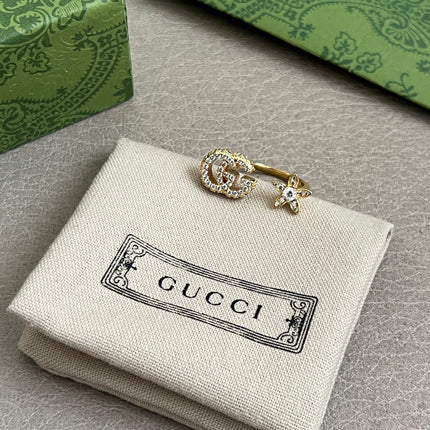 GUCCI 26S GG STAR OPEN RING WITH CRYSTALS IN GOLD TONE METAL 614453