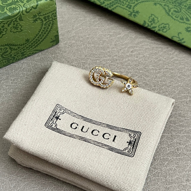 GUCCI 26S GG STAR OPEN RING WITH CRYSTALS IN GOLD TONE METAL 614453