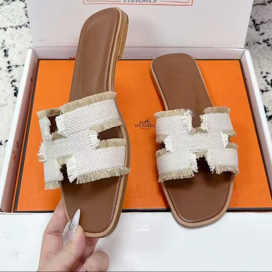 26S ORAN FRINGED SLIDE SANDALS IN ECRU CANVAS