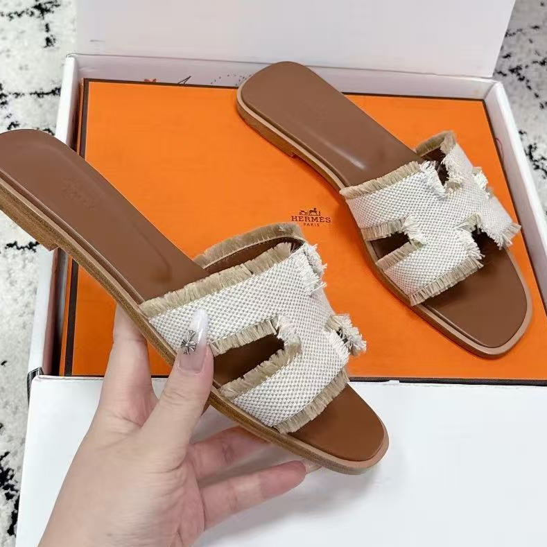 26S ORAN FRINGED SLIDE SANDALS IN ECRU CANVAS