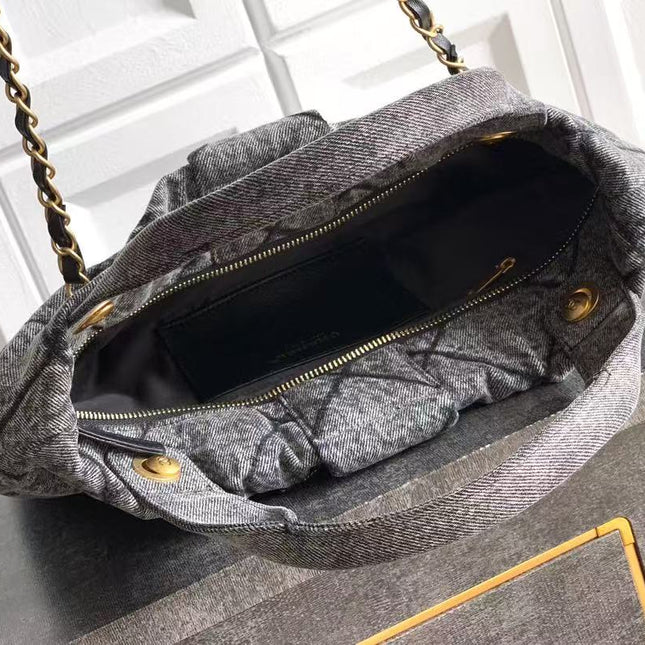 CC MAXI BOW BAG 38 IN BLACK DENIM WITH GOLD HARDWARE