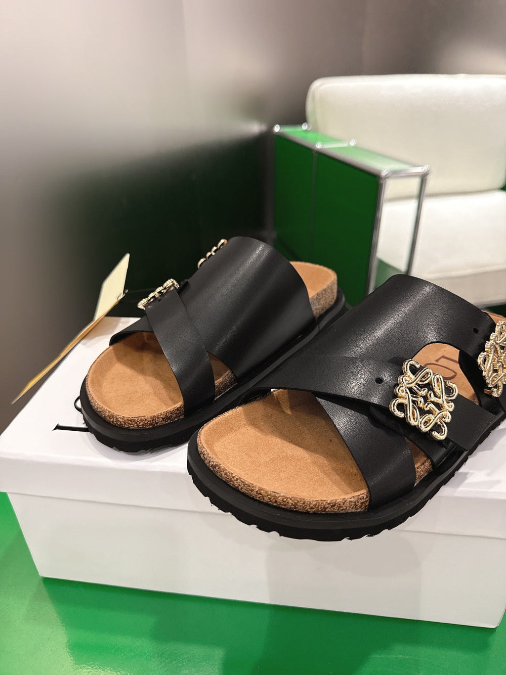 LOEWE 26S ANAGRAM FLAT SLIDES IN BLACK CALFSKIN