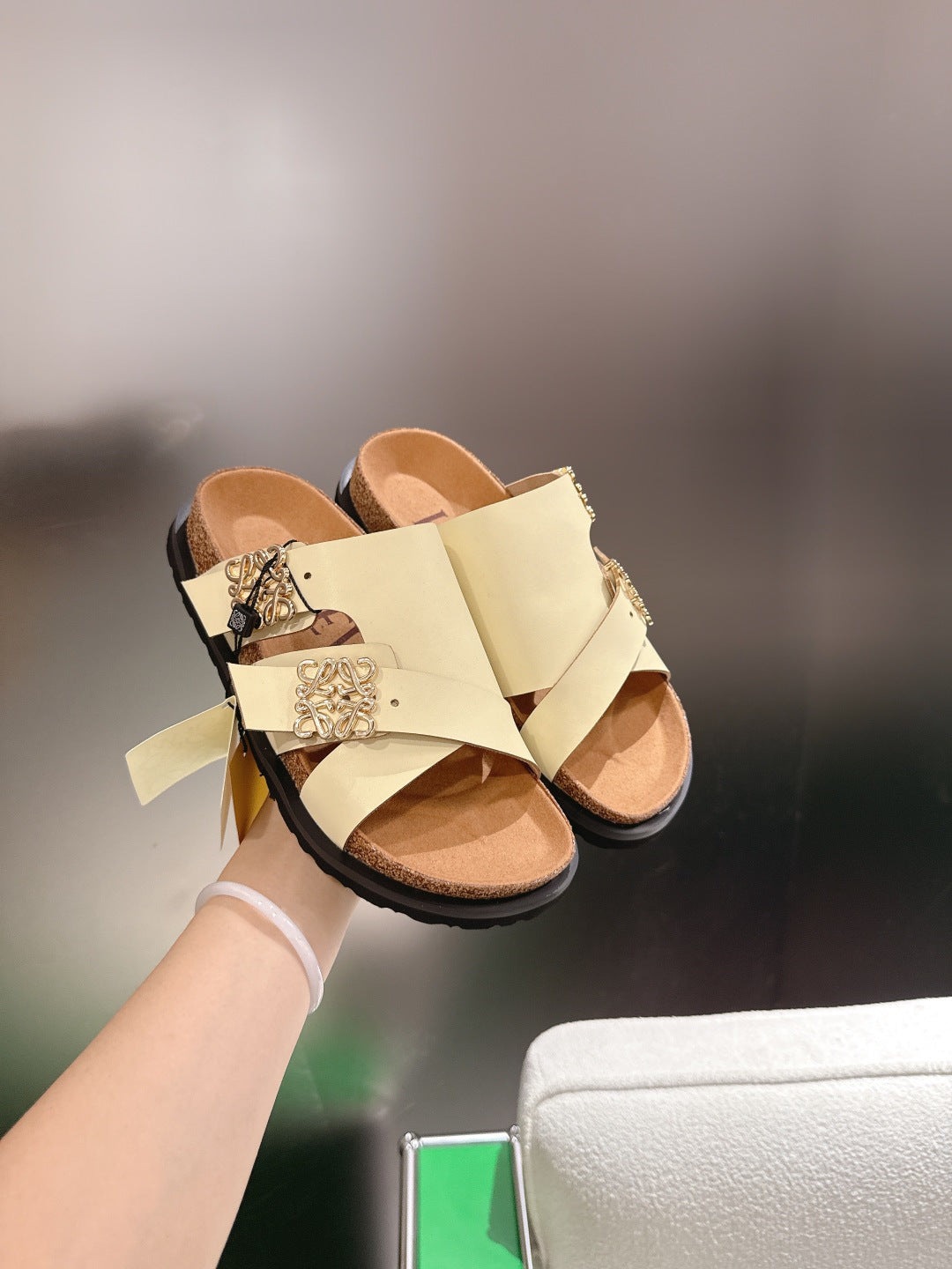LOEWE 26S ANAGRAM FLAT SLIDES IN BEIGE CALFSKIN