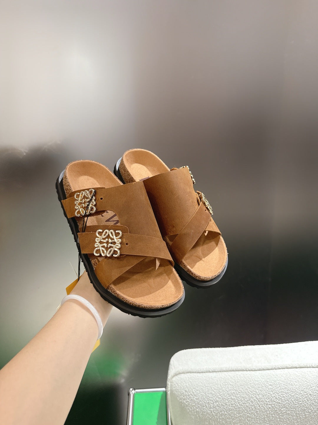LOEWE 26S ANAGRAM FLAT SLIDES IN CARAMEL BROWN SUEDE