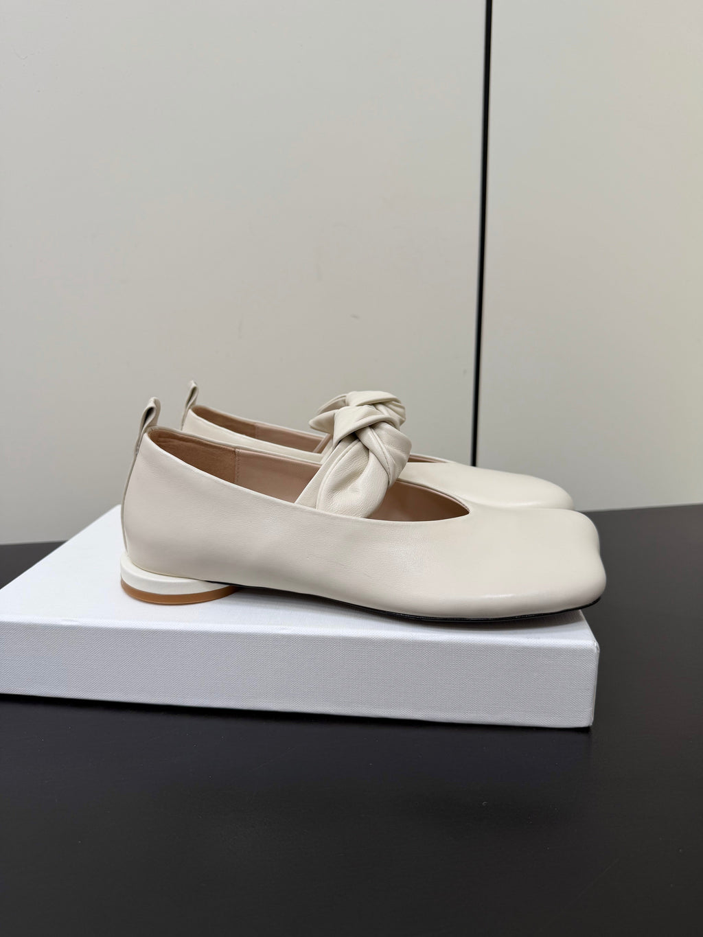 THE ROW 26S BALLET FLATS IN IVORY WHITE KNOT DETAIL CALFSKIN WITH SQUARE TOE