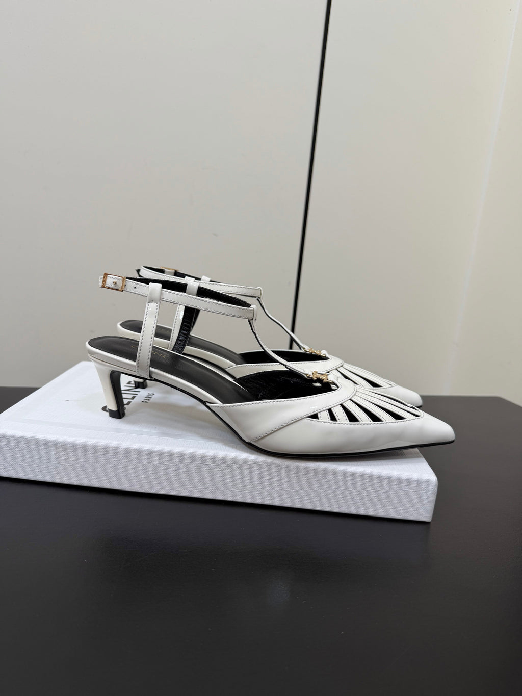 CELINE 26S TRIOMPHE T-STRAP SLINGBACK PUMPS IN WHITE PATENT CALFSKIN