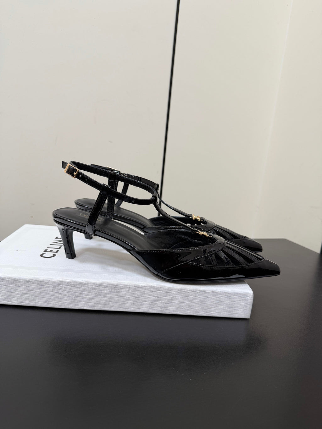 CELINE 26S TRIOMPHE T-STRAP SLINGBACK PUMPS IN BLACK PATENT CALFSKIN