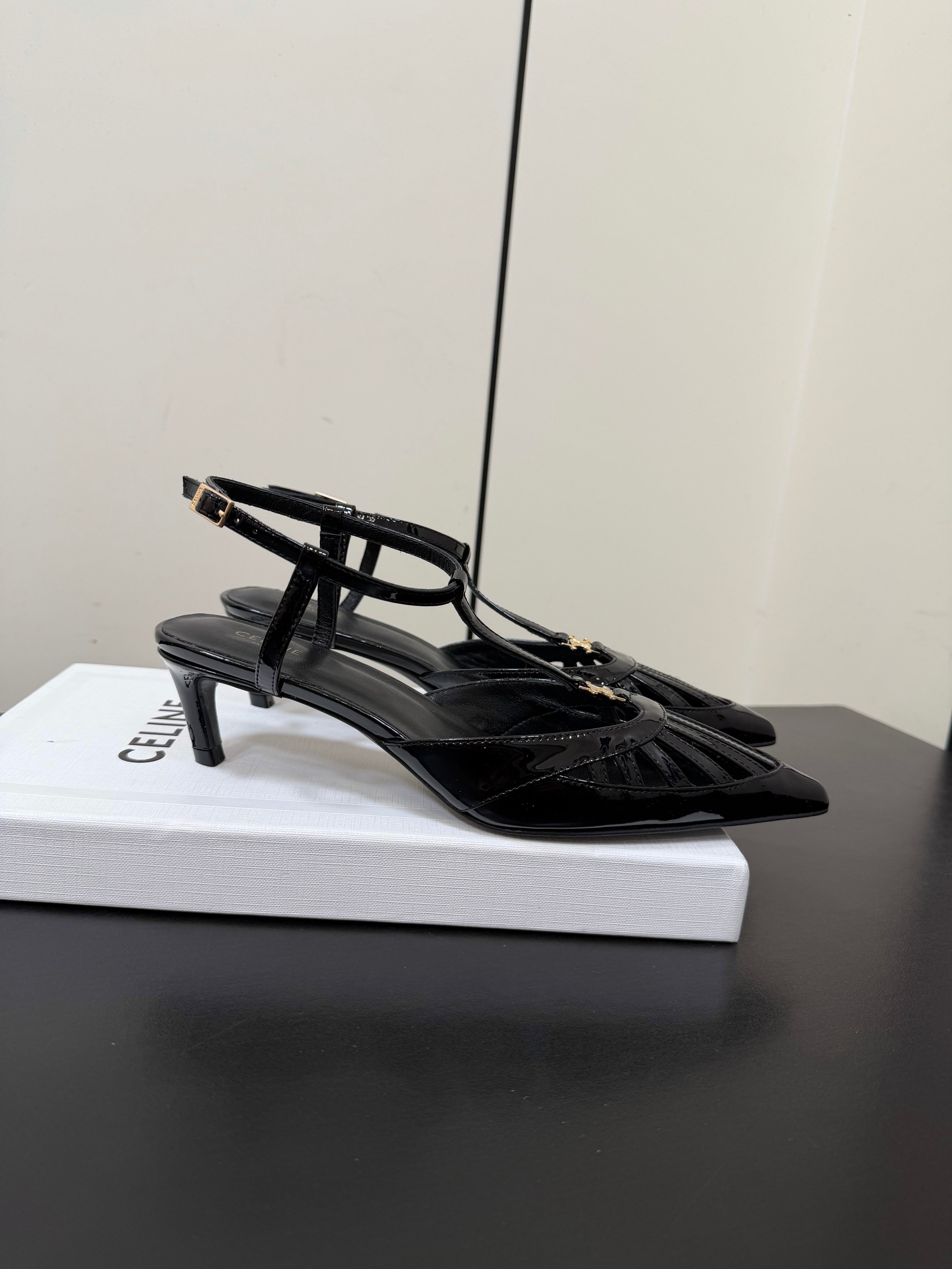 CELINE 26S TRIOMPHE T-STRAP SLINGBACK PUMPS IN BLACK PATENT CALFSKIN