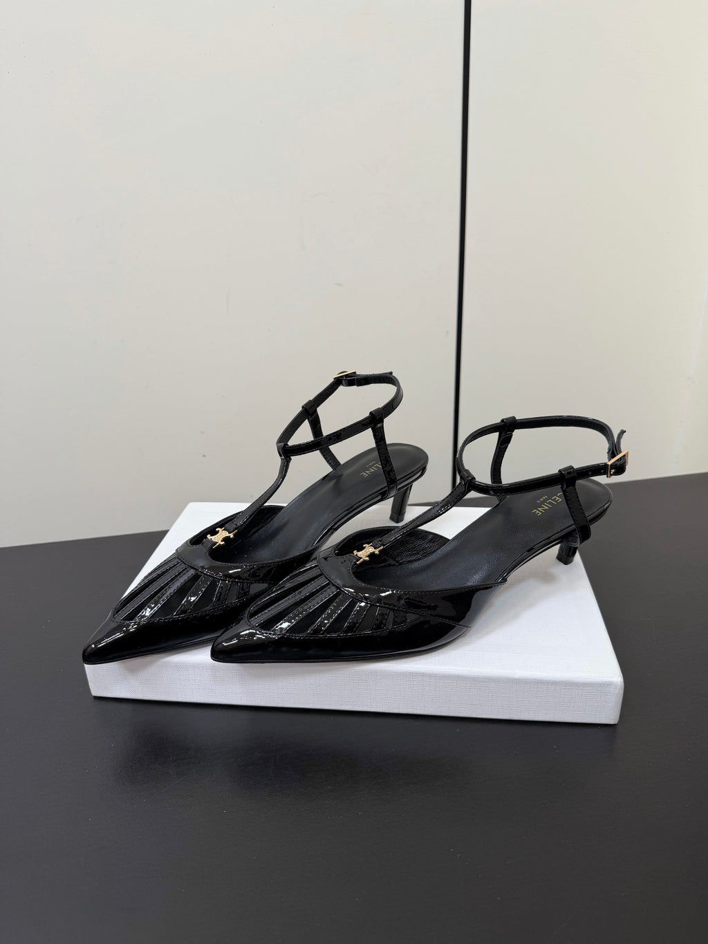 CELINE 26S TRIOMPHE T-STRAP SLINGBACK PUMPS IN BLACK PATENT CALFSKIN