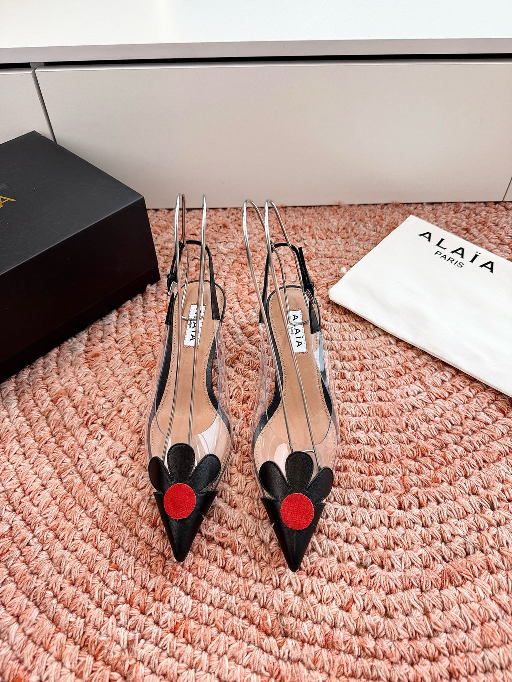 ALAIA 26S POINTED-TOE SLINGBACK HEELS IN BLACK LAMBSKIN AND TRANSPARENT PVC