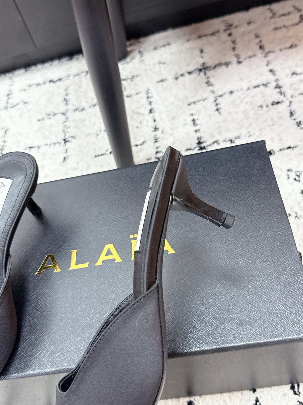 ALAIA 26S HEELED MULES 65 MM IN BLACK SATIN