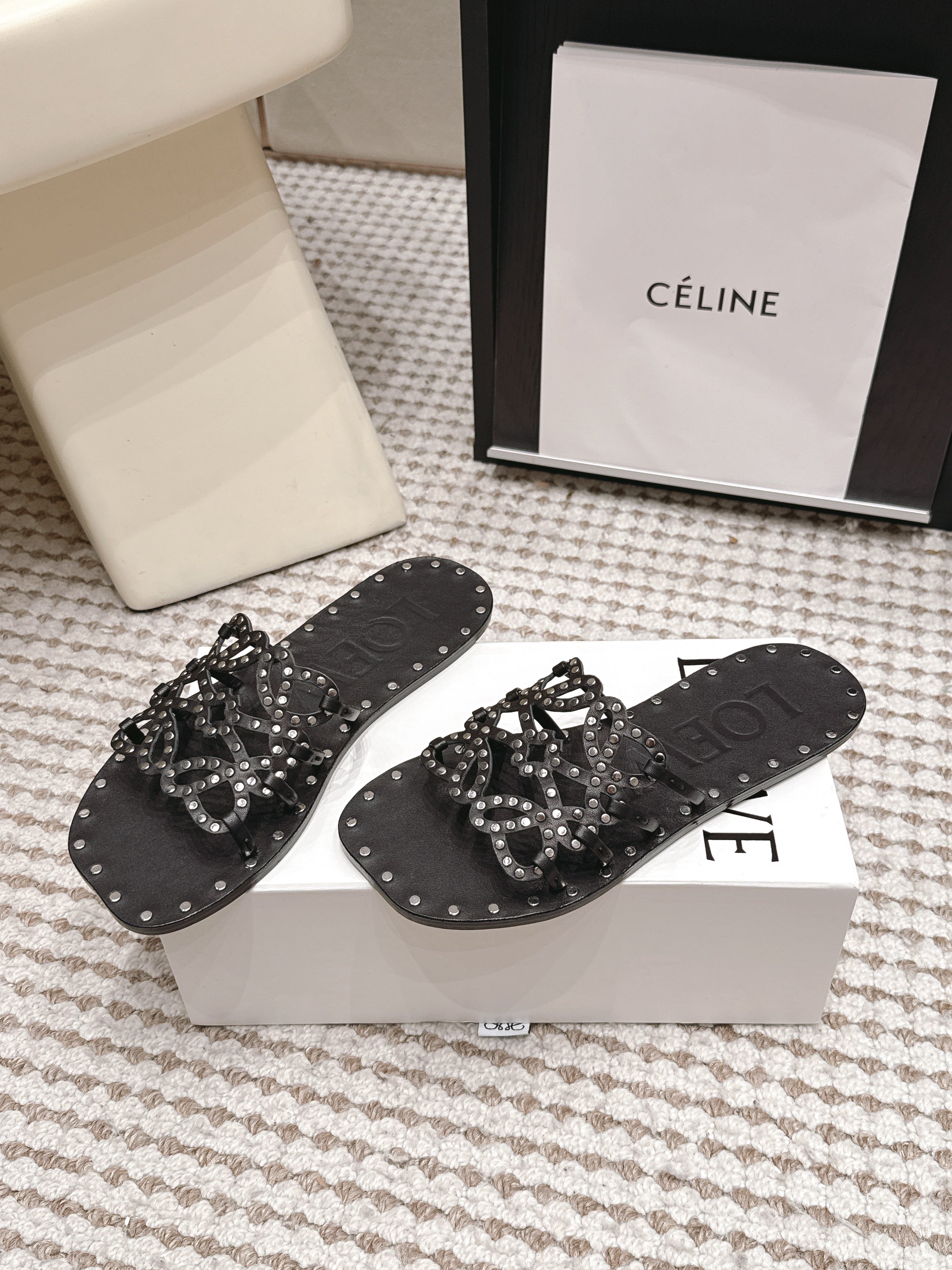 LOEWE 26S PETAL ANAGRAM SLIDE IN BLACK CALFSKIN WITH STUDS