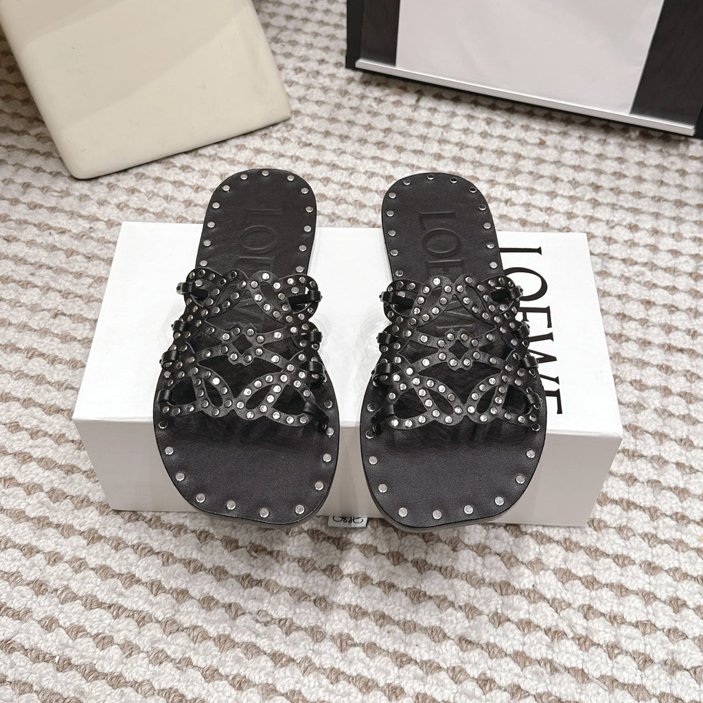 LOEWE 26S PETAL ANAGRAM SLIDE IN BLACK CALFSKIN WITH STUDS