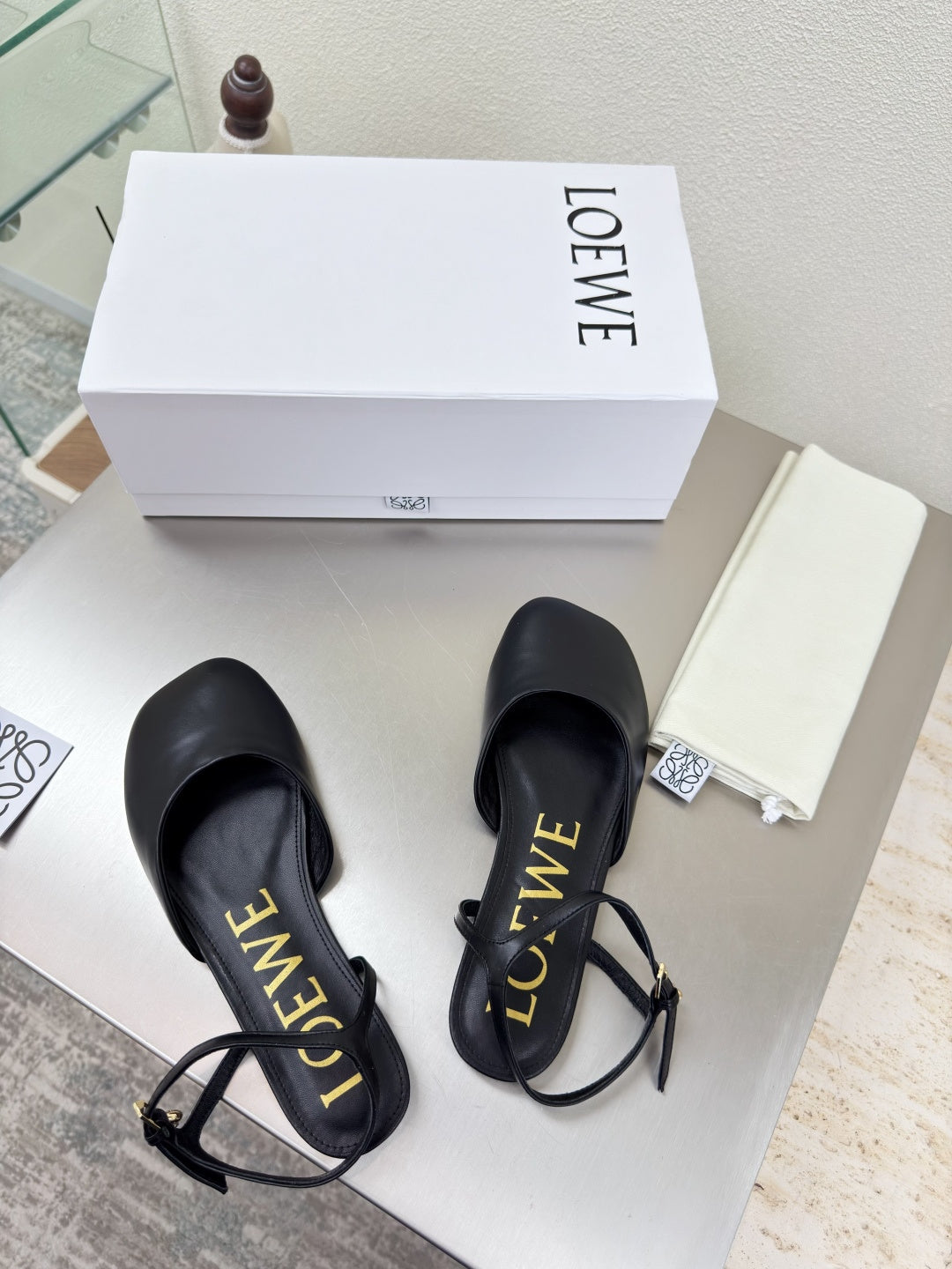 LOEWE 26S SLINGBACK FLAT PUMPS IN BLACK CALFSKIN