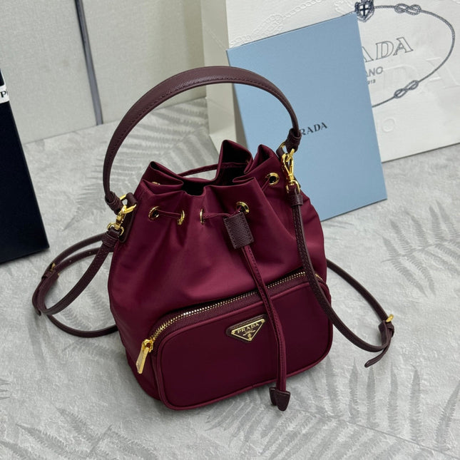 PRADA 25S DUET BUCKET BAG 23 IN BURGUNDY RE-NYLON GOLD HARDWARE