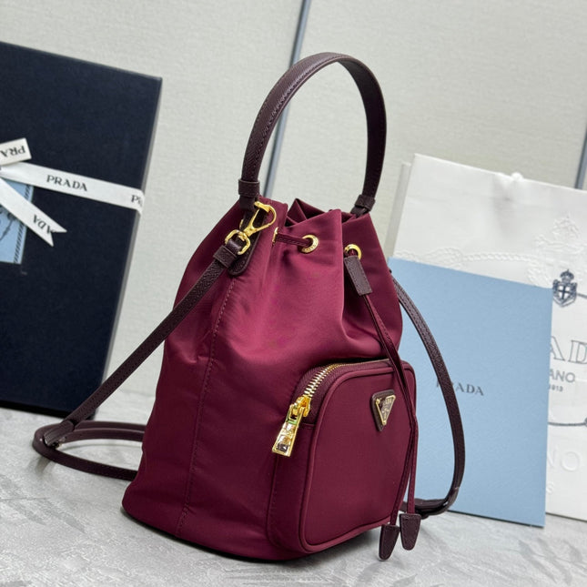 PRADA 25S DUET BUCKET BAG 23 IN BURGUNDY RE-NYLON GOLD HARDWARE