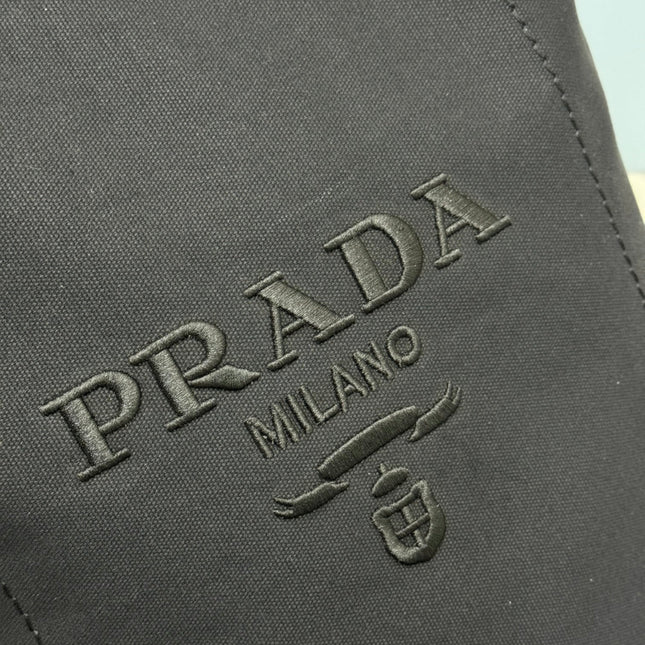 PRADA 25S DRAWSTRING BACKPACK 55 IN BLACK CANVAS LINEN SILVER HARDWARE