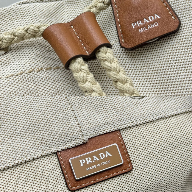 PRADA 25S DRAWSTRING BACKPACK 55 IN BEIGE CANVAS LINEN SILVER HARDWARE