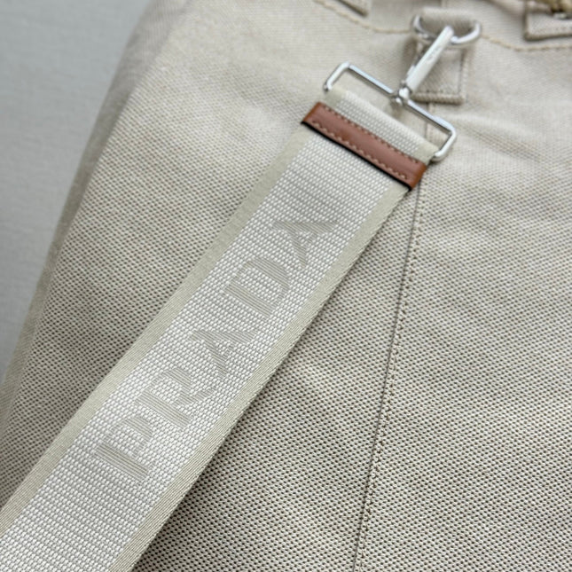PRADA 25S DRAWSTRING BACKPACK 55 IN BEIGE CANVAS LINEN SILVER HARDWARE