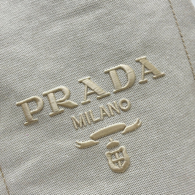 PRADA 25S DRAWSTRING BACKPACK 55 IN BEIGE CANVAS LINEN SILVER HARDWARE