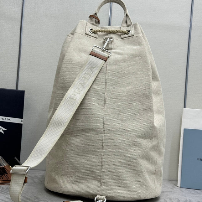 PRADA 25S DRAWSTRING BACKPACK 55 IN BEIGE CANVAS LINEN SILVER HARDWARE
