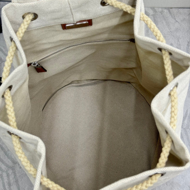 PRADA 25S DRAWSTRING BACKPACK 55 IN BEIGE CANVAS LINEN SILVER HARDWARE