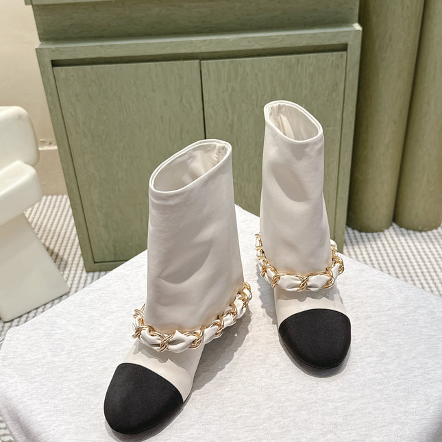 CHANEL 25S CALF-LENGTH BOOTS 45MM IN WHITE AND BLACK CALFSKIN GOLD HARDWARE