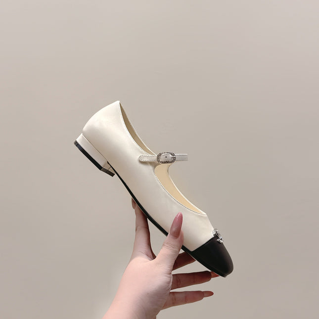 CHANEL 25S MARY JANE FLATS IN IVORY LAMBSKIN WITH BLACK CAP TOE SILVER HARDWARE