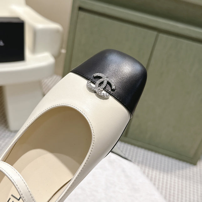 CHANEL 25S MARY JANE FLATS IN IVORY LAMBSKIN WITH BLACK CAP TOE SILVER HARDWARE