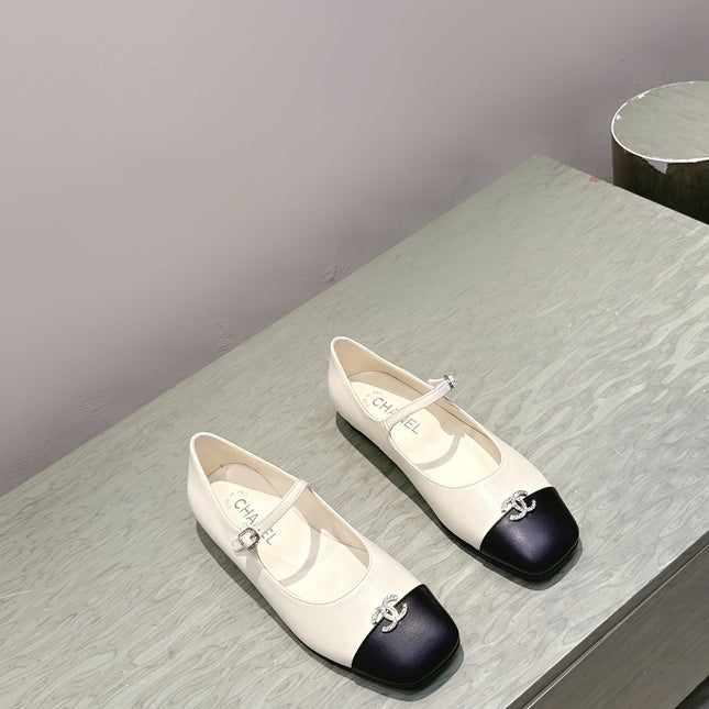 CHANEL 25S MARY JANE FLATS IN IVORY LAMBSKIN WITH BLACK CAP TOE SILVER HARDWARE