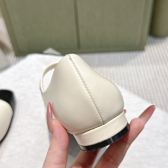 CHANEL 25S MARY JANE FLATS IN IVORY LAMBSKIN WITH BLACK CAP TOE SILVER HARDWARE