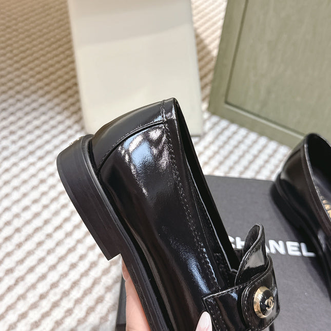 CHANEL 25S GODDESS FLAT LOAFERS IN BLACK PATENT CALFSKIN GOLD HARDWARE