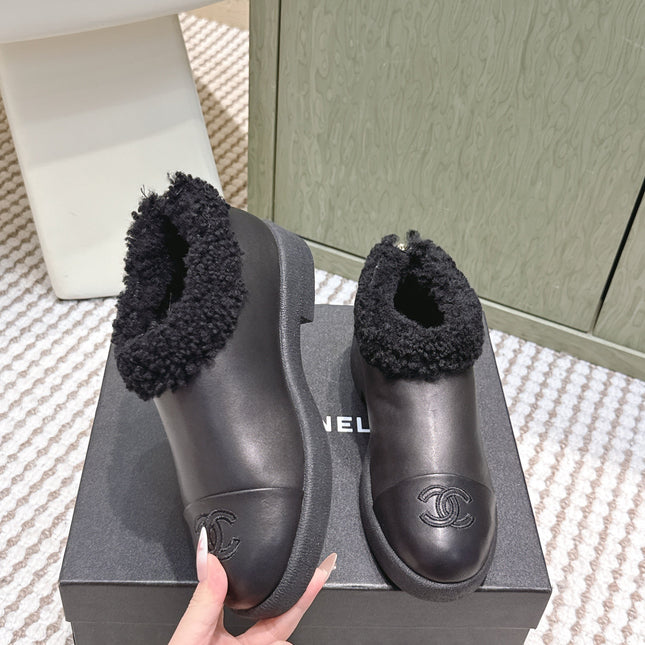 CHANEL 25S SHORT BOOTS IN BLACK CALFSKIN WITH SHEEPSKIN LINING