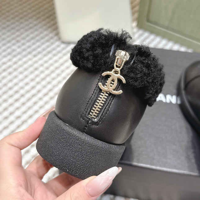 CHANEL 25S SHORT BOOTS IN BLACK CALFSKIN WITH SHEEPSKIN LINING