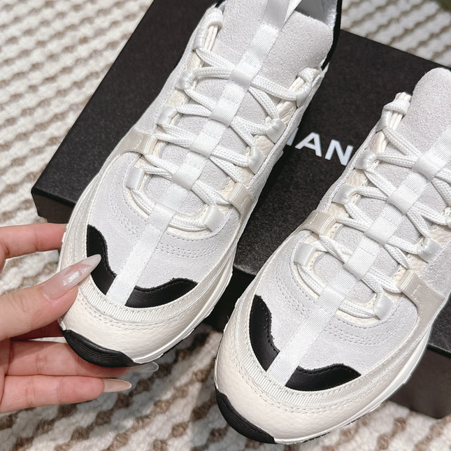 CHANEL 25S LUXURY SNEAKERS IN WHITE CALFSKIN AND SUEDE