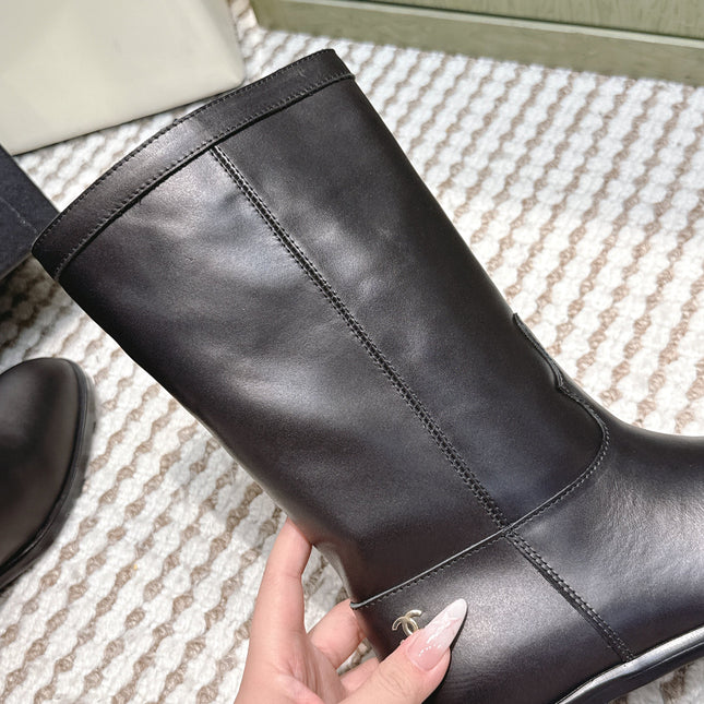 CHANEL 25S MID-CALF BOOTS IN BLACK CALFSKIN