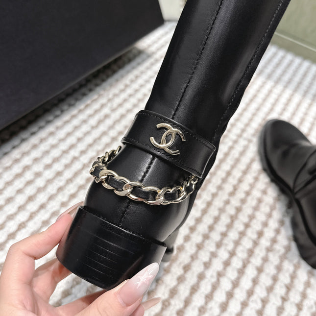 CHANEL 25S MID-CALF BOOTS IN BLACK CALFSKIN WITH ROUND TOE AND ZIPPER